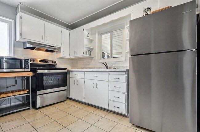 Building Photo - Updated Brick Ranch with Gorgeous Finishes & Ideal Location!