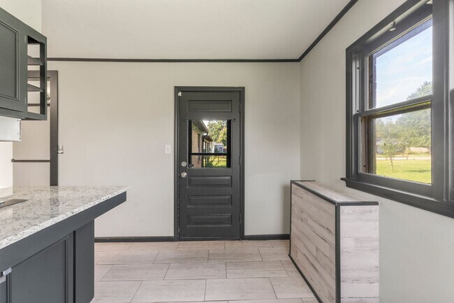 Building Photo - Newly renovated home with a large yard per...