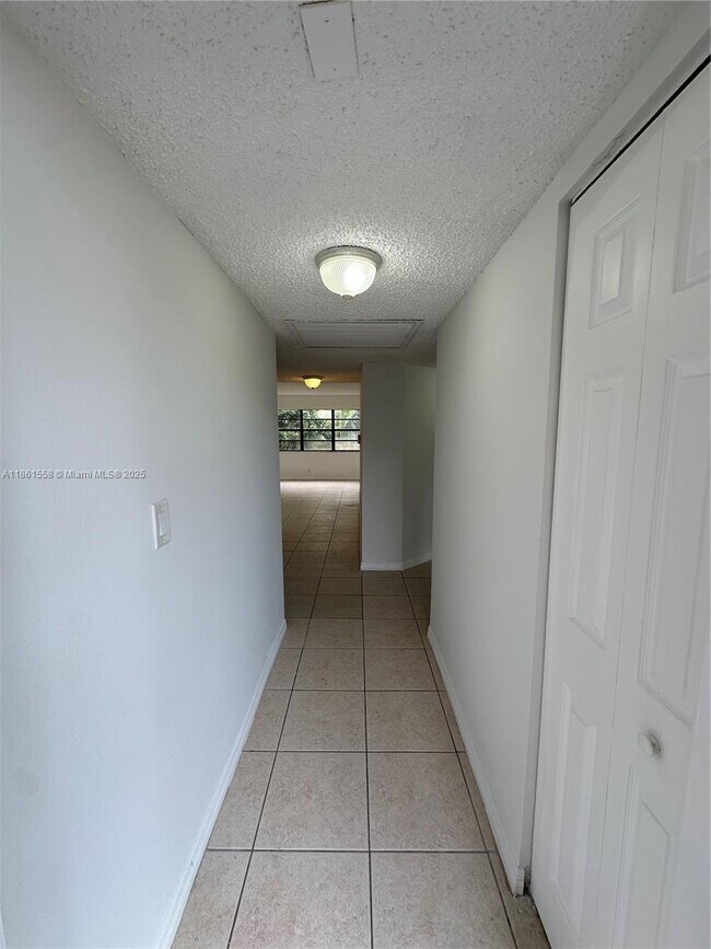 Building Photo - 11213 Royal Palm Blvd
