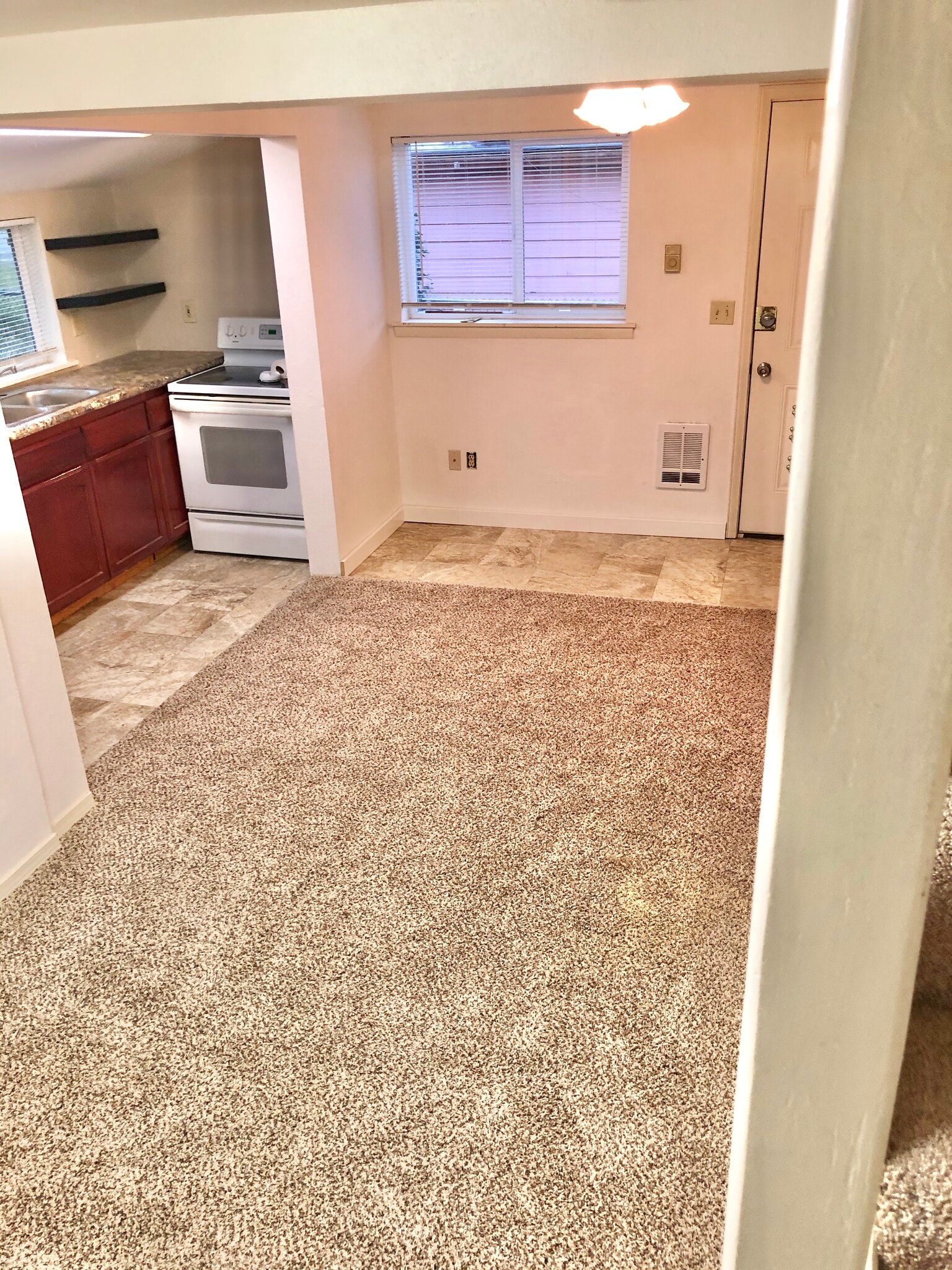 view from stairs, looking at living room, cozy! - 1007 W Main St