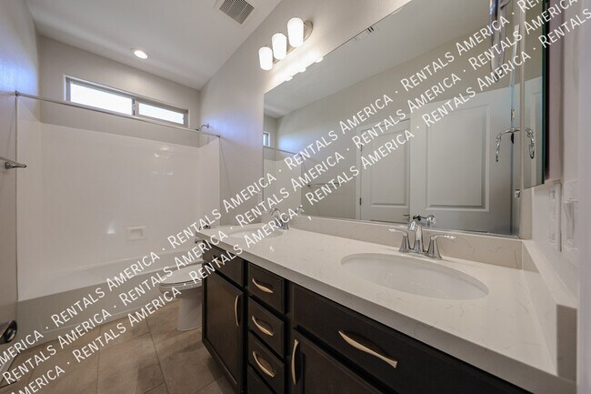 Building Photo - 11128 S 54th Ln