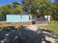 Building Photo - 1201 Riverview Dr SW