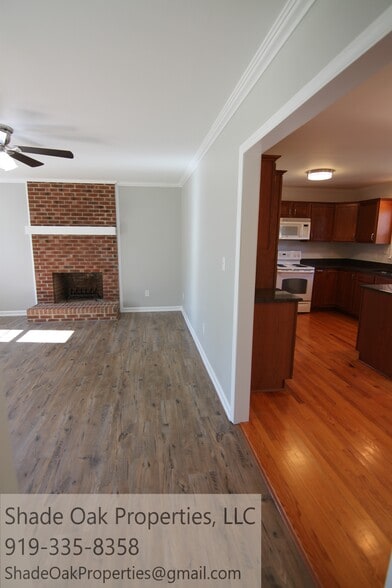 Living room, dining room, kitchen entry - 8608 Manns Loop Rd