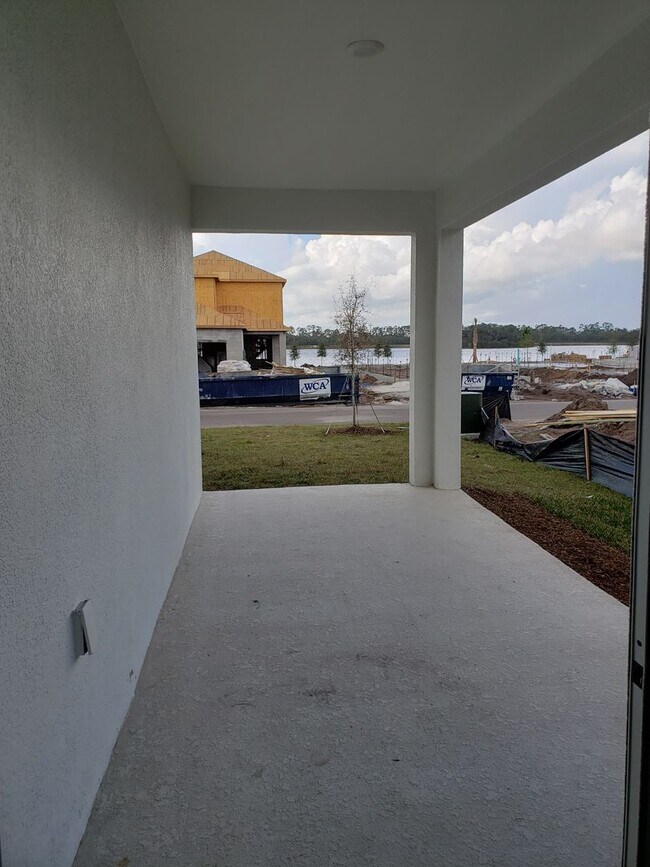 Building Photo - Bridgewalk Corner Lot Home with Wooded View and Solar Panels