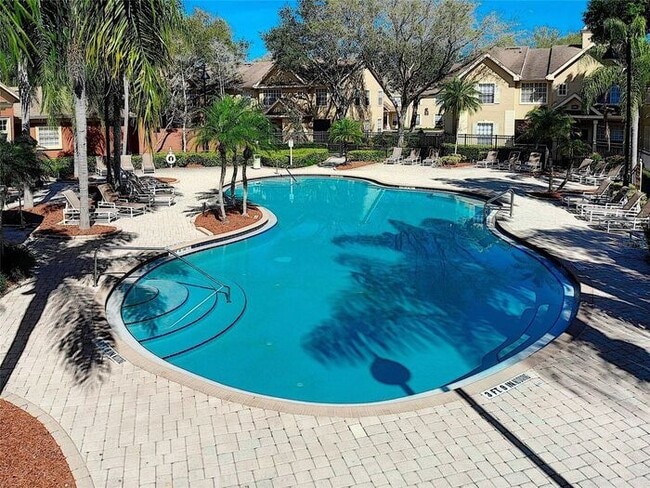 Building Photo - Perfect 2/2 Split Floorplan Condo with Washer/Dryer in Lovely Crescent Place at Lake Lotus Condom...