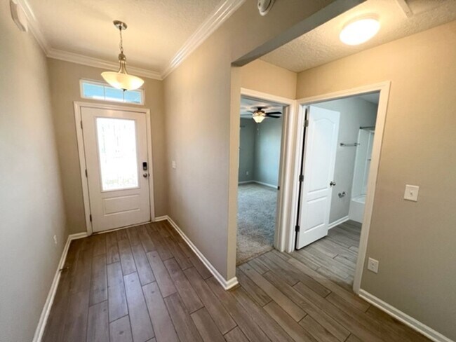 Building Photo - Introducing this stunning 4-bedroom, 2-bat...