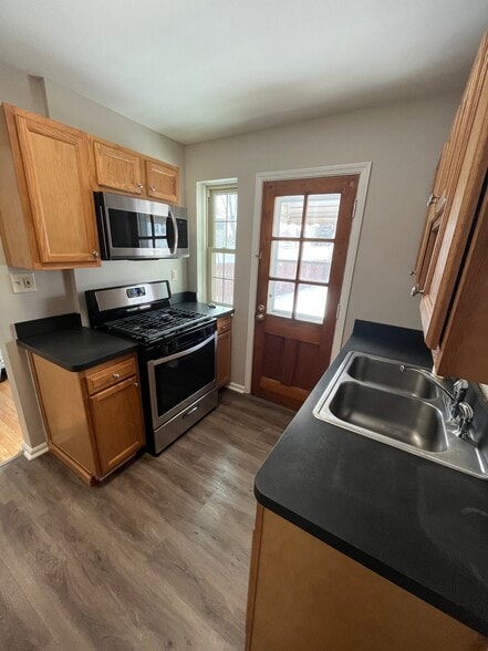 New kitchen appliances including gas stove and microwave - 270 E 200th St