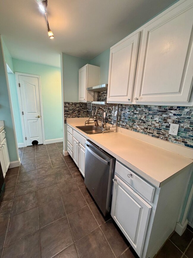 Building Photo - Welcome to Waters Edge Condos!