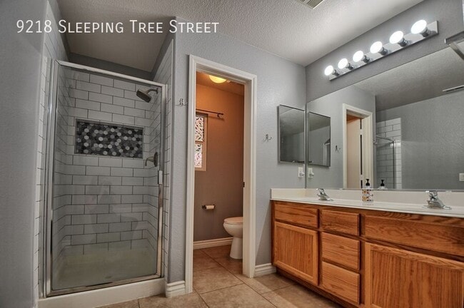 Building Photo - 9218 S Sleeping Tree St