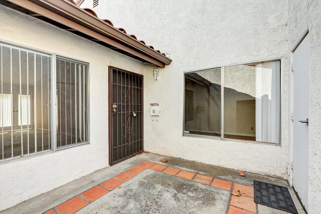 Building Photo - LOVELY ONE STORY CONDO WITH ONE CAR GARAGE