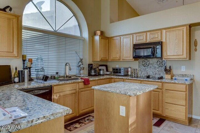 Building Photo - 9113 E Palm Tree Dr