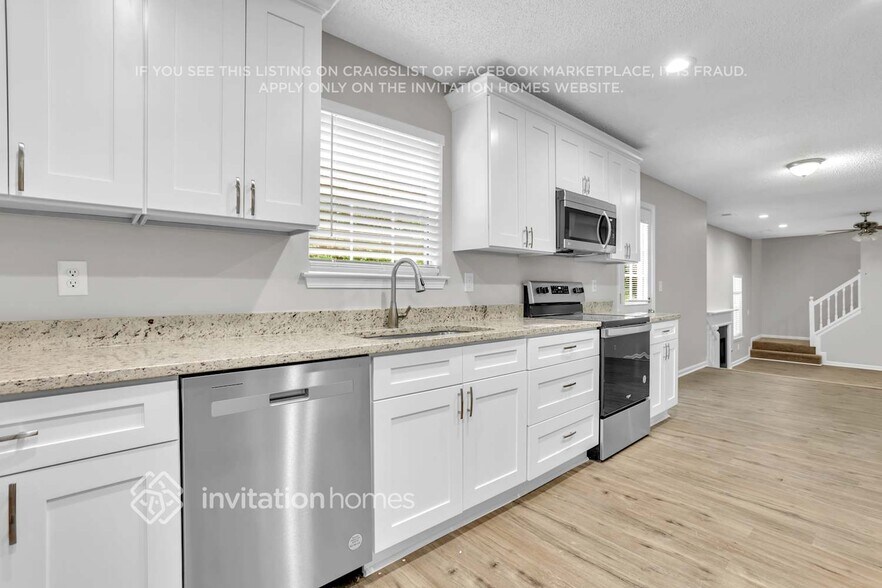 Building Photo - 5614 Carriage Walk Way