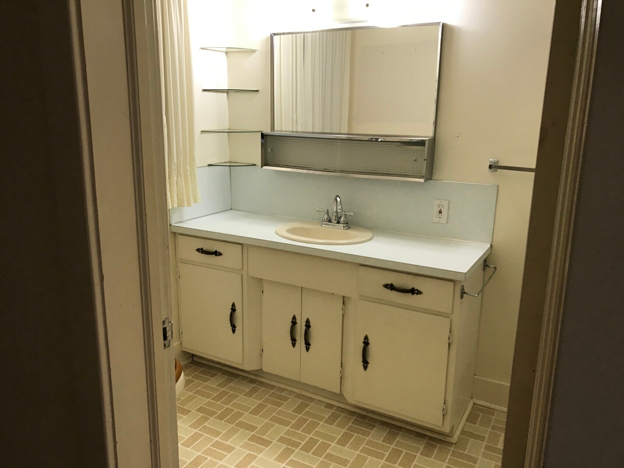 Bathroom sink - 615 W Main St