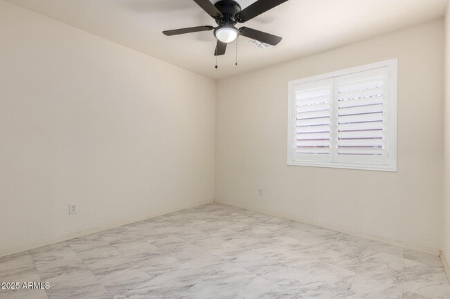 Building Photo - 4410 N 124th Ave