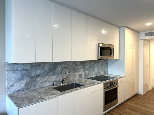Building Photo - Aalii - Furnished Studio/1BA/1PK