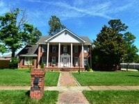Building Photo - Custom Built brick Manor close to airport ...