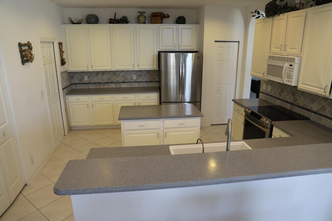 Building Photo - 11174 Winding Pearl Way