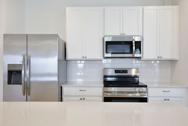 Building Photo - Pristine and Under a Year Old — 4 Bed, 2.5 Bath, 2-Car Garage, 2,071 Sq Ft