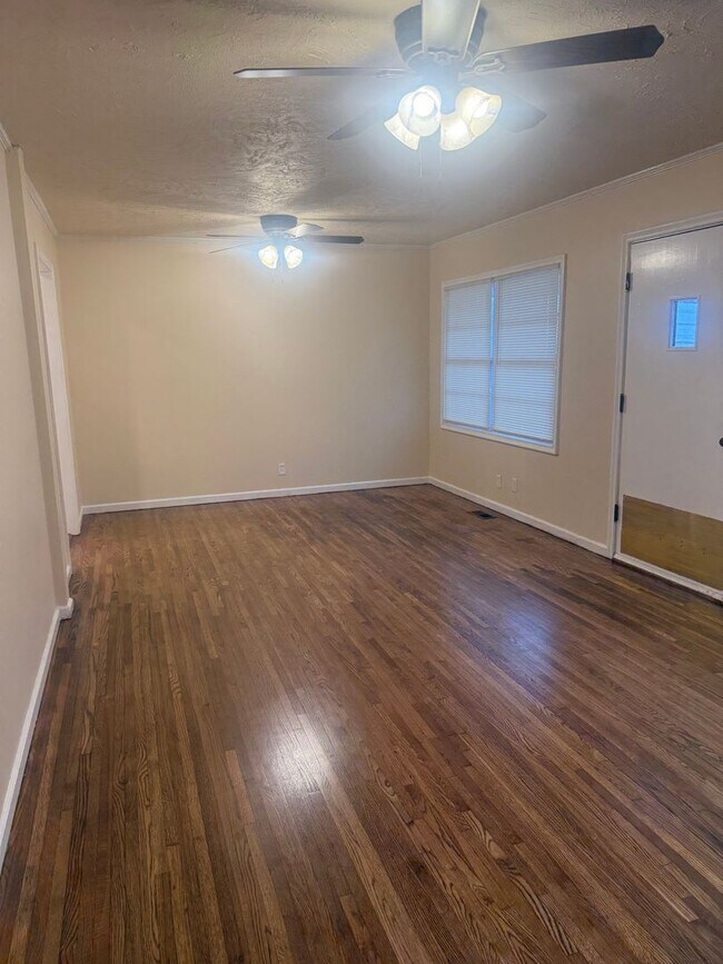 Building Photo - Step into this beautifully updated 1950's gem, where charm meets modern convenience