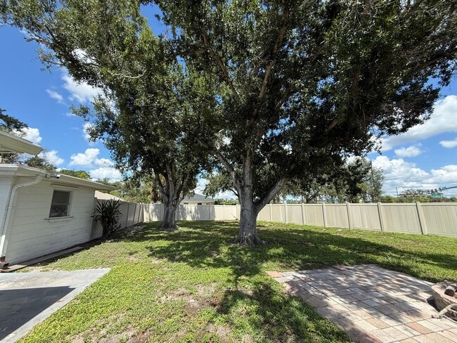 Building Photo - 2/2 with Fenced Yard, Garage and Laundry, Available Now!