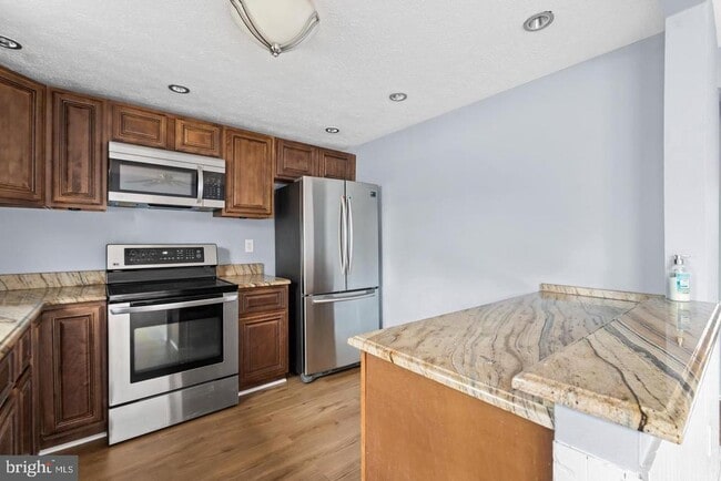 Building Photo - 8018 Covington Ave