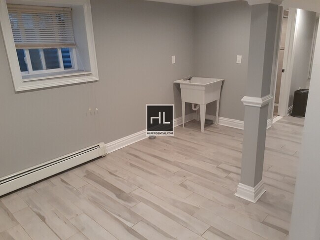 Building Photo - Renovated basement studio in Jamaica Queens