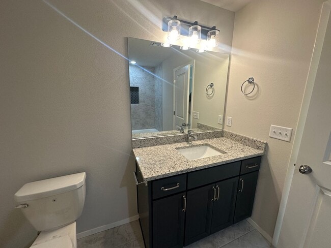 Building Photo - New - 4 bedroom in Bixby - Gated Community