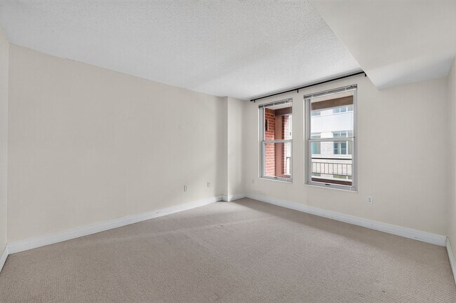 Building Photo - Penn Quarter 1BR Condo with Balcony, Garage Parking, Storage, Concierge, and Rooftop Deck.