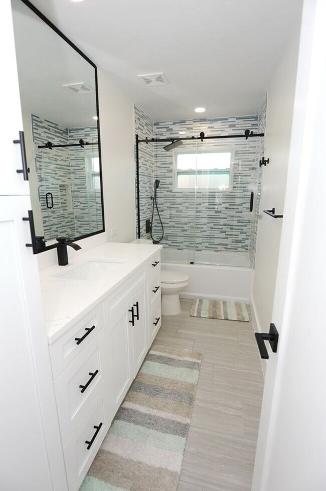 Building Photo - ANNUAL RENTAL Naples Park 3 Bedroom // 2 Bathroom Single Family Home