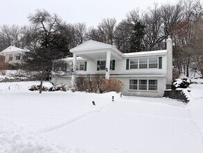 Building Photo - 4 Bed, 2 Bath Home for Rent – Unique Design & Retro Charm