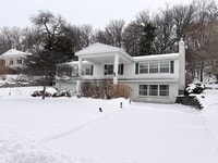 Building Photo - 4 Bed, 2 Bath Home for Rent – Unique Design & Retro Charm