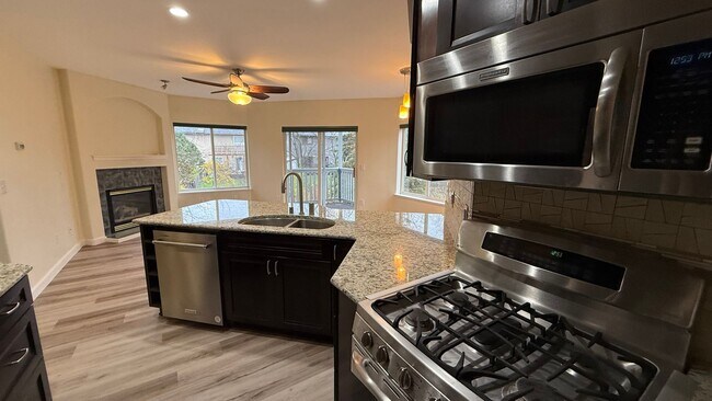 Building Photo - Major Updates! Raised Ranch Style Condo wi...