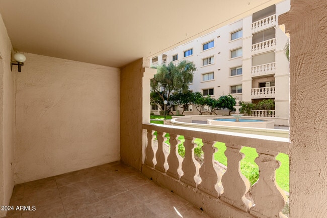 Building Photo - 7950 E Camelback Rd