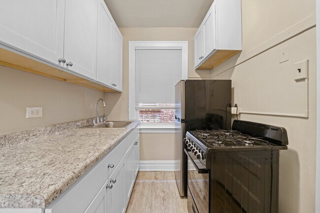 Building Photo - Sunny, Convertible Studio with Two Rooms a...