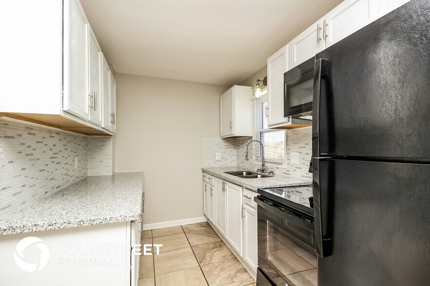 Building Photo - 7909 Garfield Ave