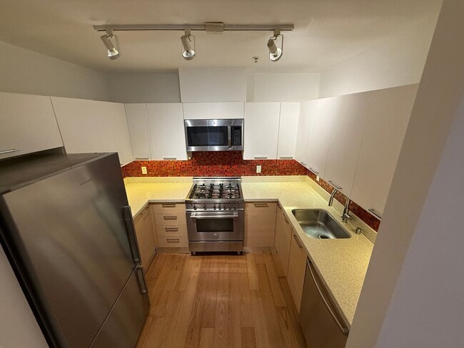 Building Photo - Quiet Rear-Unit in the Mission — Private Terrace, Garage, Roof Deck