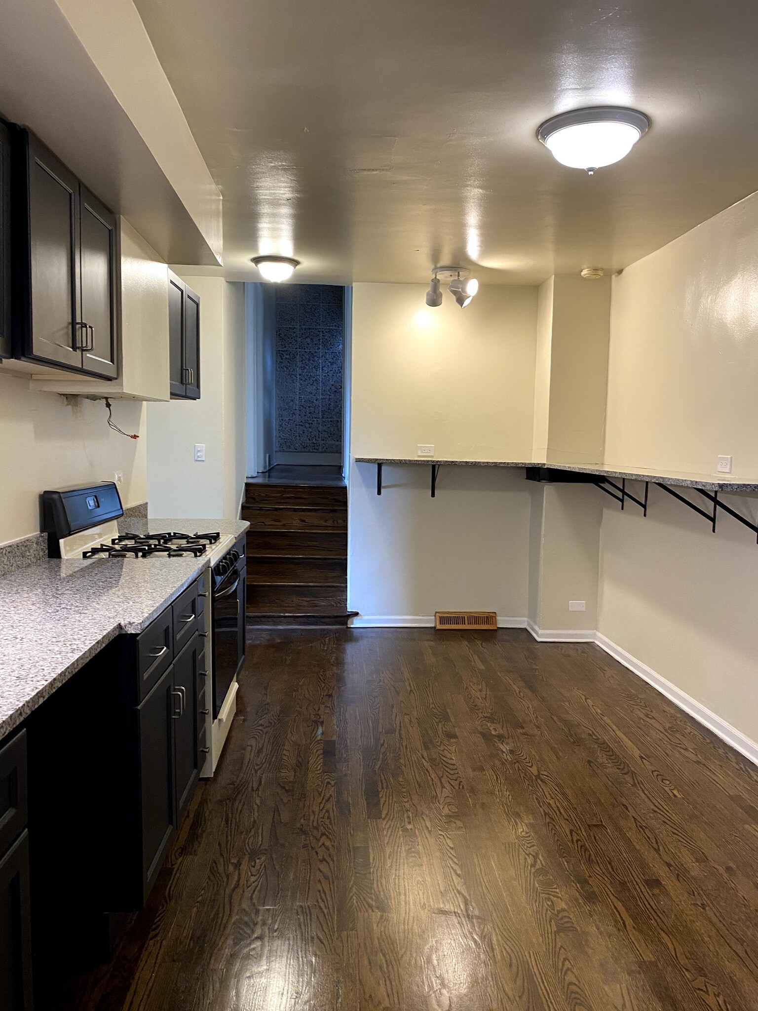 Kitchen stairs leading to #2 & #3 BR/bath - 1415 W Devon Ave