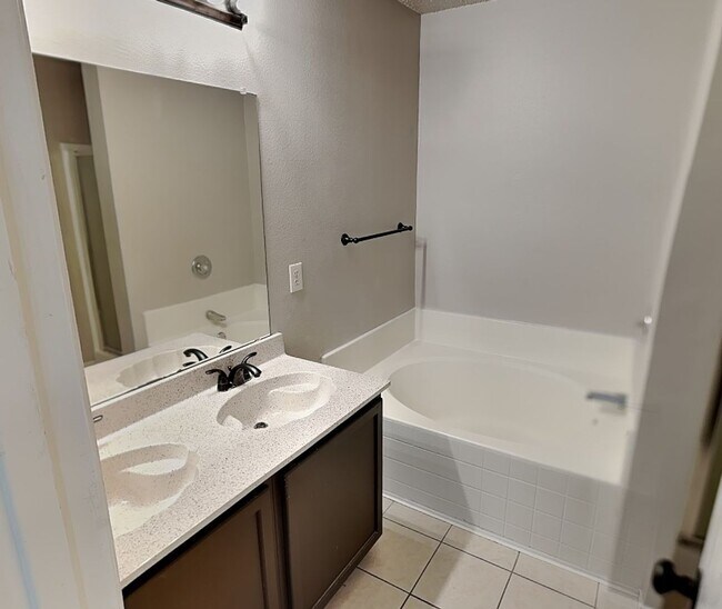 Building Photo - Corner Lot Charmer with Two-Story Deck and Bonus Game Room!