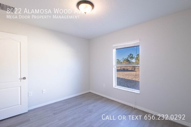 Building Photo - 8022 Alamosa Wood Ave