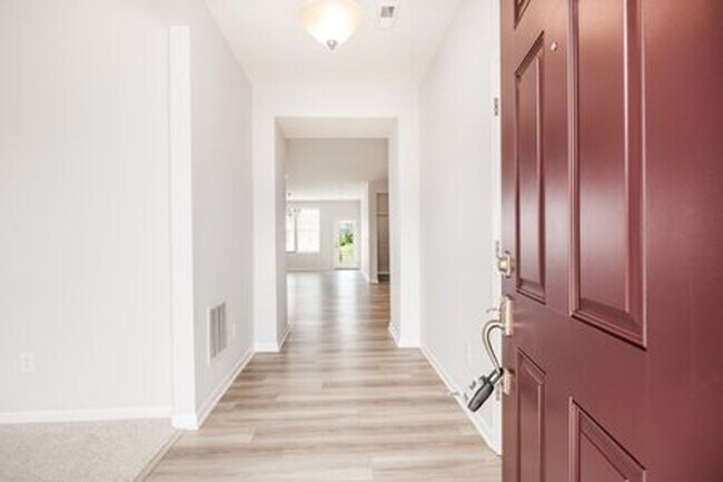 Building Photo - Updated 3-Bedroom Home with 3 Baths, Open-Concept Layout, Luxury Flooring & Bright Modern Kitchen