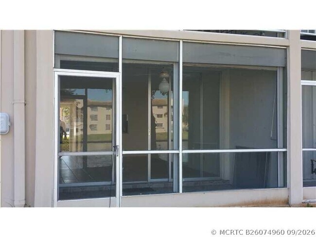 Building Photo - 6091 NW 61st Ave