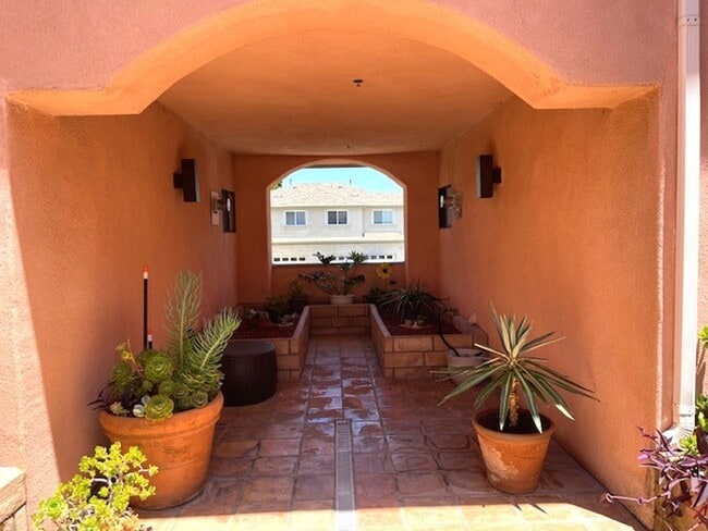 Building Photo - Quaint Gated Community near Pacific View Mall