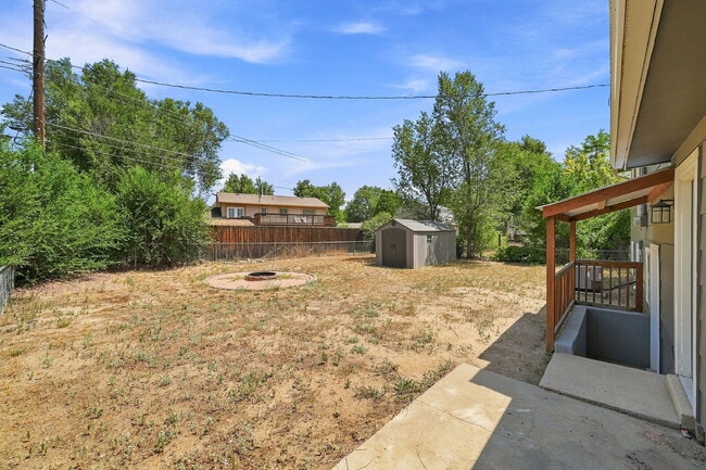 Building Photo - $2,095.95, 4 bed, 2 bath, located in Colorado Springs with a fenced-in backyard.