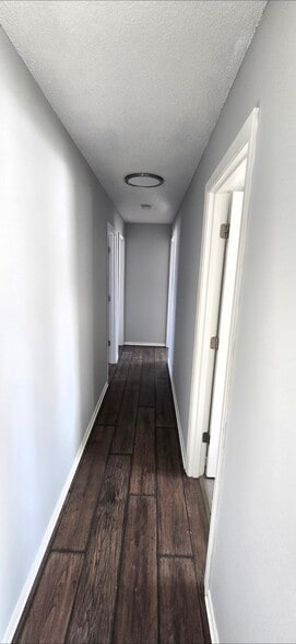 Hallway leads to 3 bedrooms and bathroom - 4664 Suffolk Rd