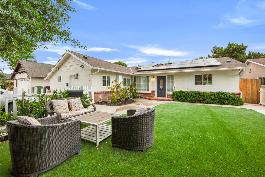 Tucked behind attractive white picket fences - 6908 Royer Ave