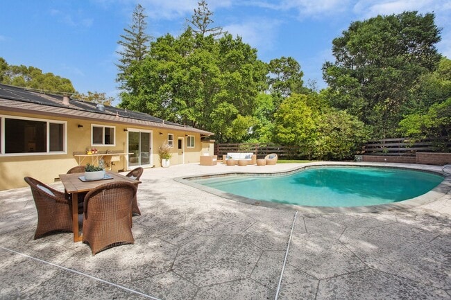 Building Photo - Updated 3 bedroom + office & pool, single ...