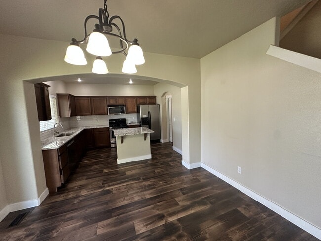 Building Photo - "Charming 4-Bed Home with Granite Accents & Hardwood Elegance in Meridian!"