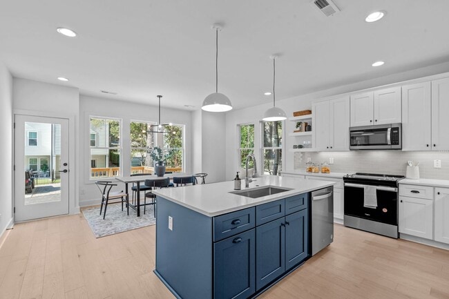 Building Photo - New Construction 4BD, 3.5BA End-Unit Ralei...