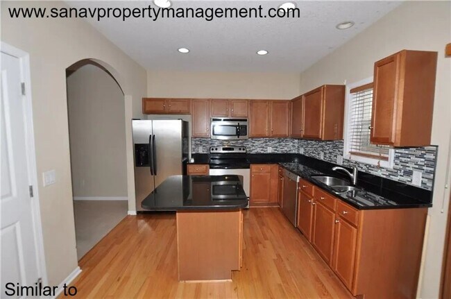 Building Photo - ? Stylish 2-Bedroom Townhome in Prime West Des Moines! Move in Special- May rent free