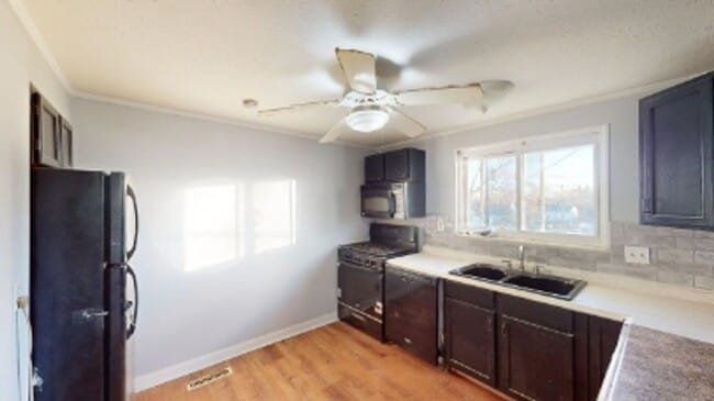 Building Photo - 4-Bedroom Split-Level Updated Home with Garage, Deck, and Large Backyard